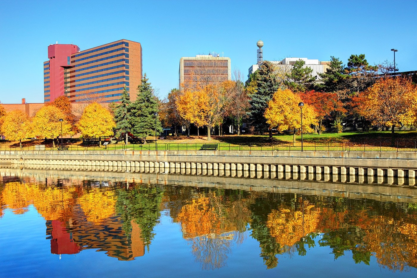 Autumn colored leaves along the Flint River in downtown Flint, Michigan
